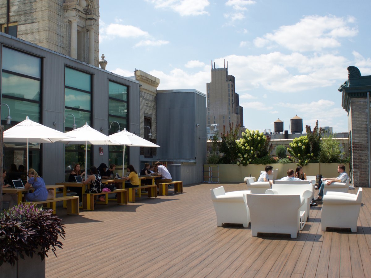 a-door-on-the-7th-floor-leads-to-the-wifi-enabled-roof-deck-a-favorite-common-space-among-employees